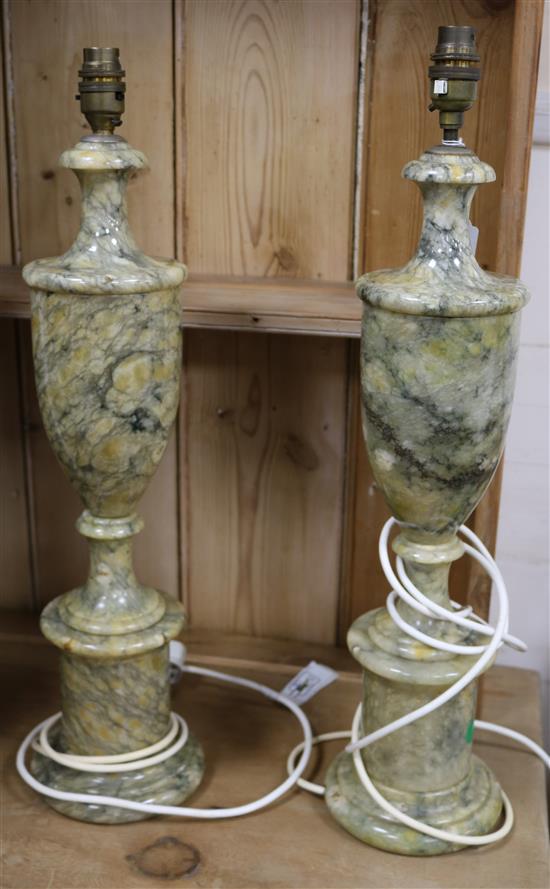 A pair of alabaster table lamps, with shades. height 49cm excl. electrical fitting